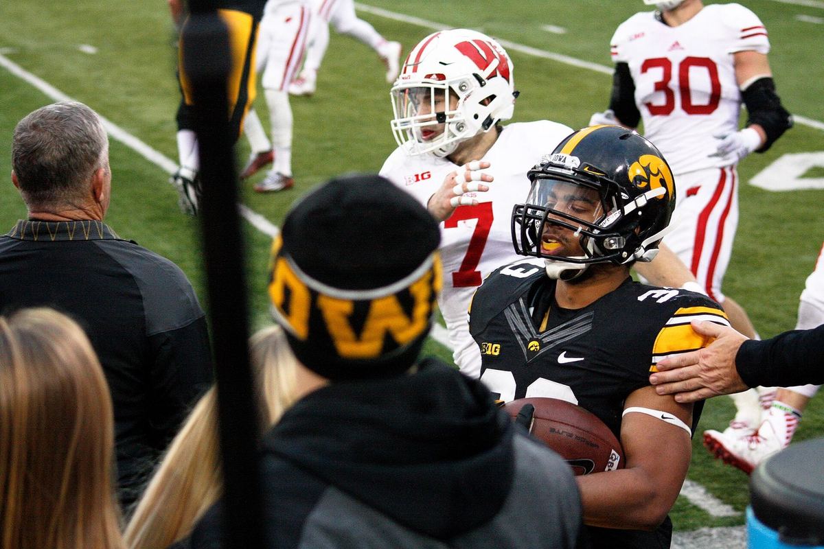 Iowa and Wisconsin players at Kinnick Stadium