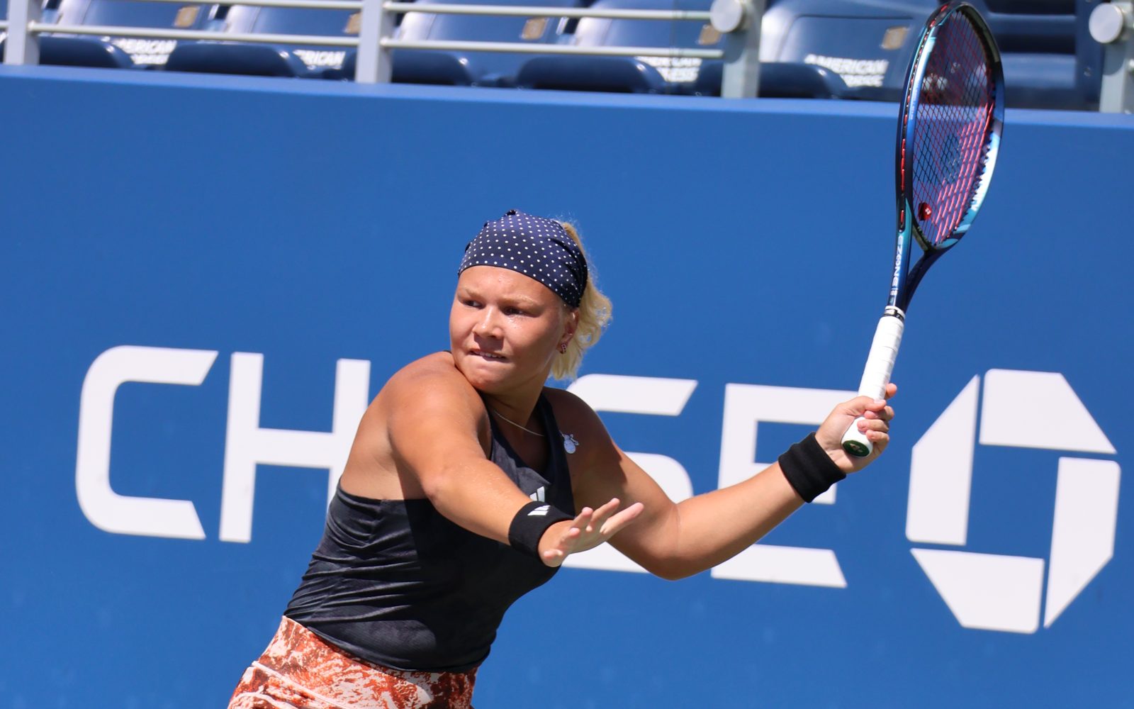 Diana Shnaider hitting a forehand at the US Open