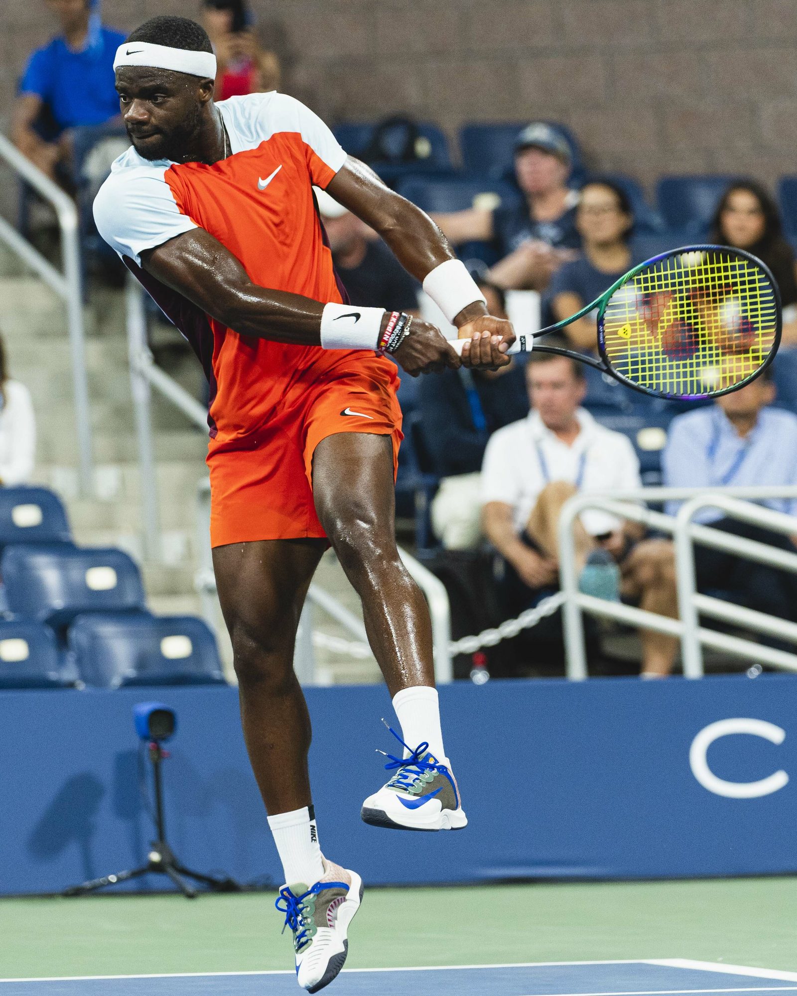 Frances Tiafoe hitting a backhand