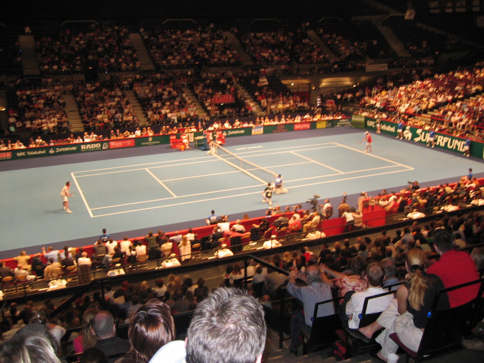 Centre Court at Wiener Stadthalle in Vienna during a match, with a full crowd